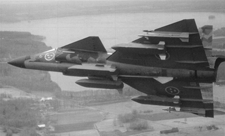 AJS37 med fyra bombkapslar och två RB24J